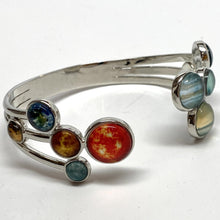 Load image into Gallery viewer, Close-up of left side of Adjustable Bracelet with Sun and inner planets, and giant planets and Pluto on right side of gap.