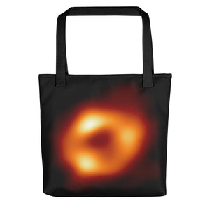 Digital mock up of a black tote bag with black handle printed with the Event Horizon Telescope image of the Sgr A* supermassive black hole in the Milky Way Galaxy.