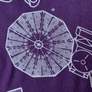 illustration detail of the Lucy spacecraft solar panel in silver ink on a purple plush-weave scarf