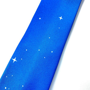 Keck Observatory Necktie, bright blue tie with observatory dome and night sky illustration in white, detail of the stars, on a white background