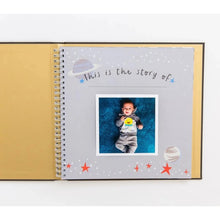 Load image into Gallery viewer, Baby memory book with a spiral binding, open to the first page with a photo of a baby and text on a white background.