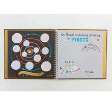 Load image into Gallery viewer, Open book with colorful pages on a white background