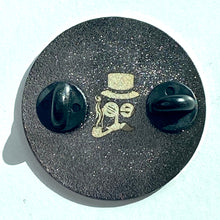 Load image into Gallery viewer, reverse of enamel pin showing two black stoppers and the PINtelligentsia logo