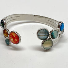 Load image into Gallery viewer, Close-up of right side of Adjustable Bracelet with giant planets and Pluto, and Sun and inner planets on the left side of the gap.
