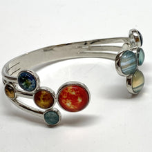 Load image into Gallery viewer, Close-up of left side of Adjustable Bracelet with Sun and inner planets, and giant planets and Pluto on right side of gap.