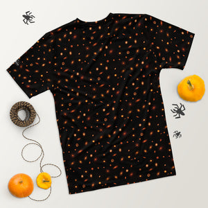 Digital mock-up of t-shirt back, black with small red and orange images of planet-forming disks at various angles, Startorialist logo on left arm, Halloween decor to the sides of shirt.