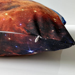 detail of the JWST Cosmic Cliffs of the Carina Nebula throw pillow showing the white hidden zipper at the corner
