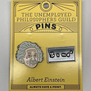 Pins set on The Unemployed Philospphers Guilld Card: Pin with shape and image of Albert Einstein face, and rectangular black pin with equation E = mc^2 in metallic script. Bottom text on card: "always have a point."